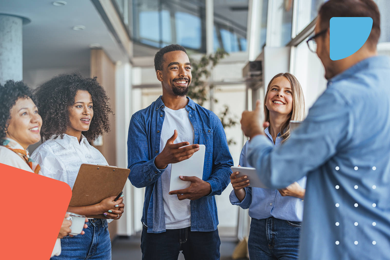 Colleagues having informal office discussion