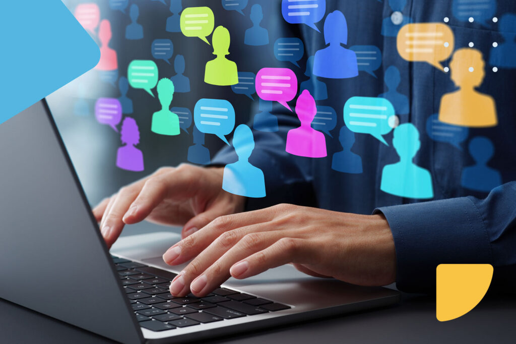 Hands typing with social icons