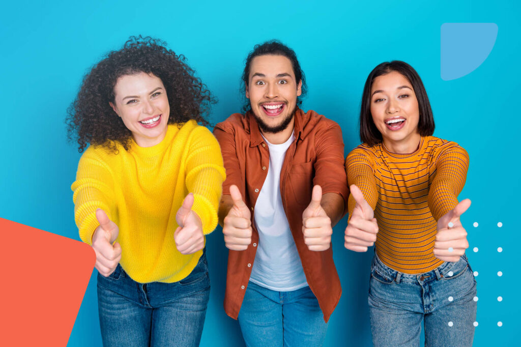 Three people giving thumbs up