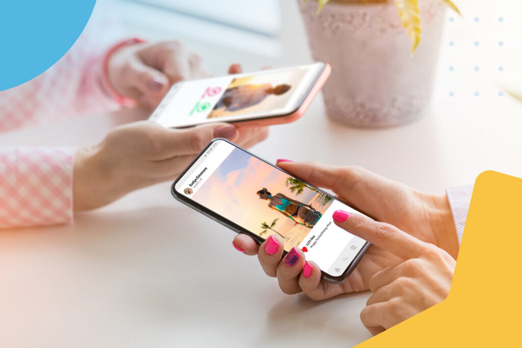 Two people comparing mobile phones