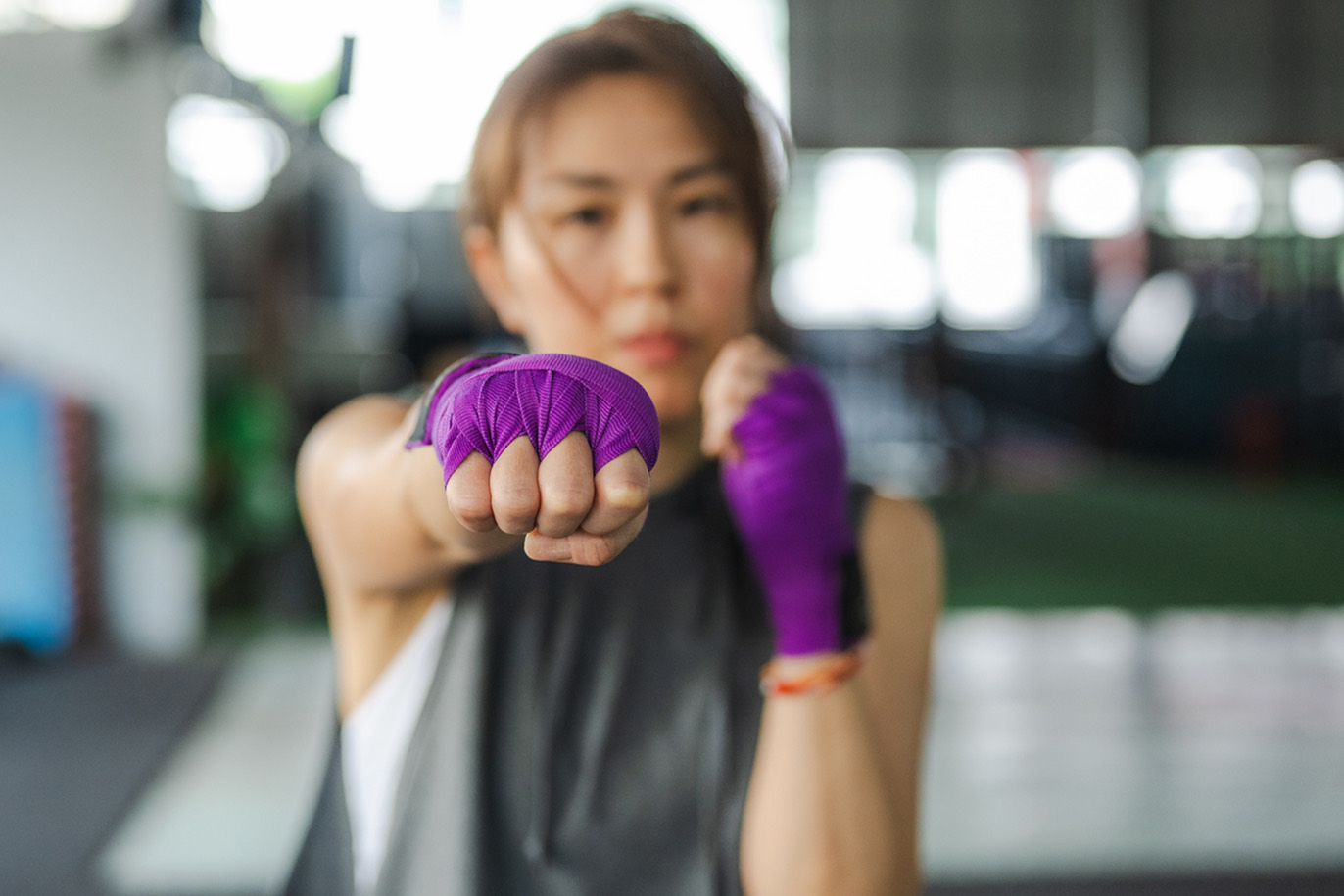 Female boxer throwing a punch