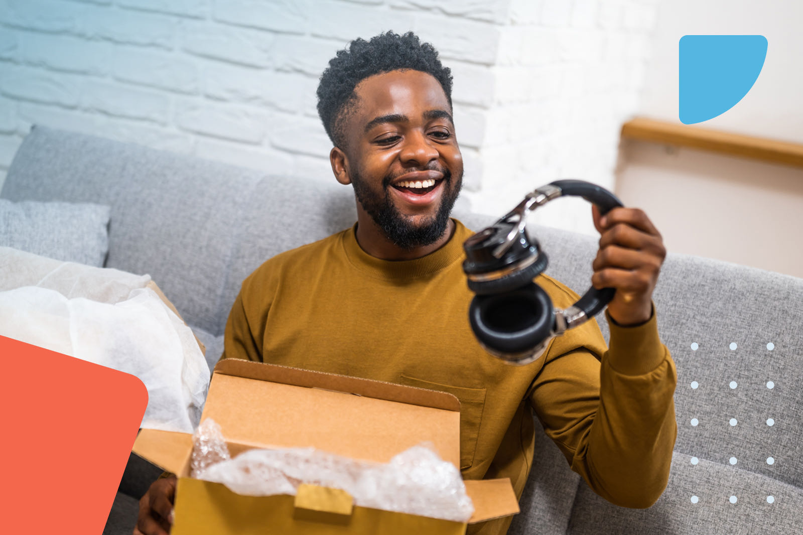 Man unboxing new black headphones