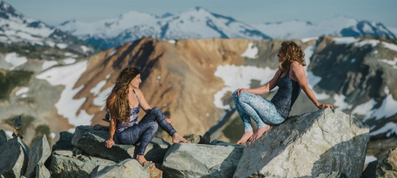 Inner Fire ambassadors two women yoga clothing mountain top