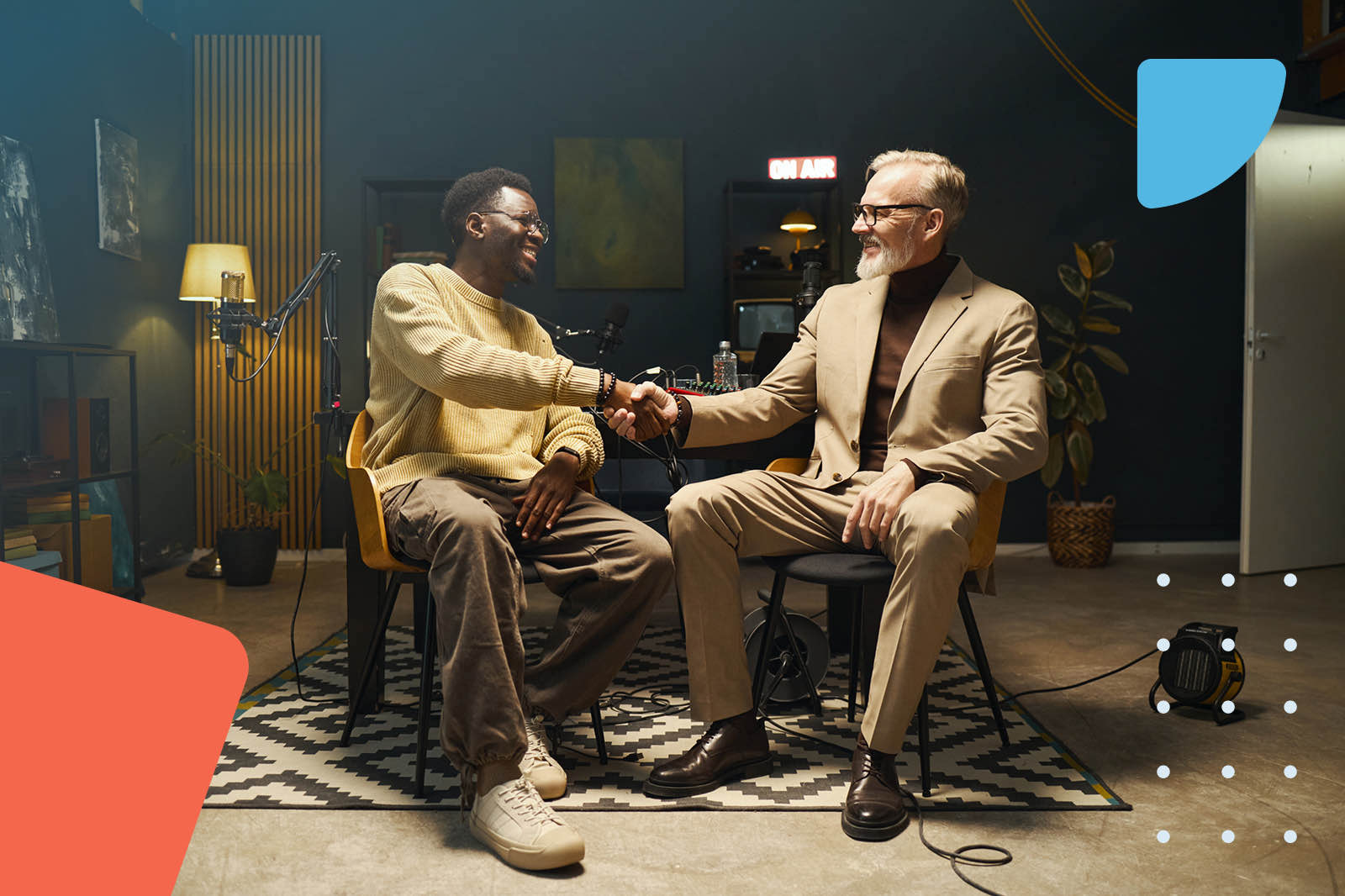 Two men shaking hands indoors