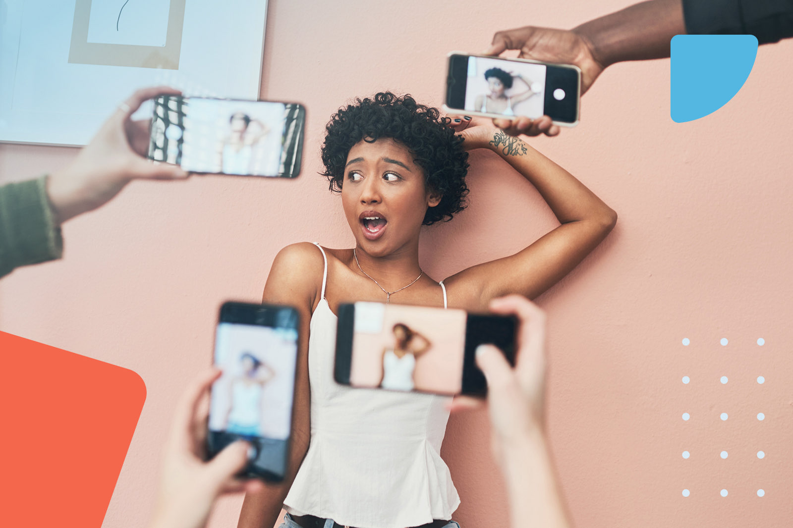 Woman surrounded by many phones
