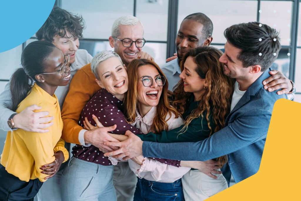 Diverse office team group hug