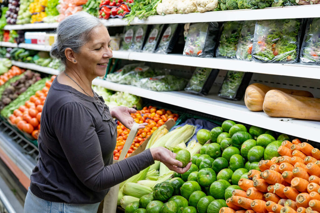 Woman shopping for fresh produce