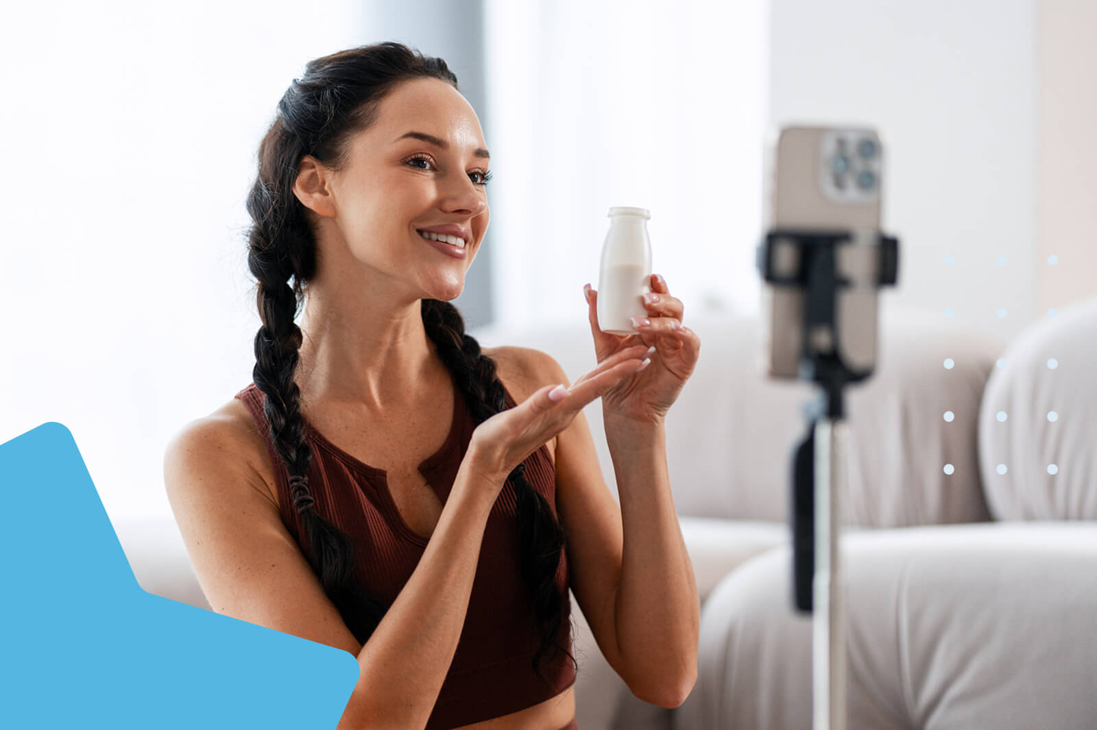 A brand ambassador is using a smartphone to film a product review