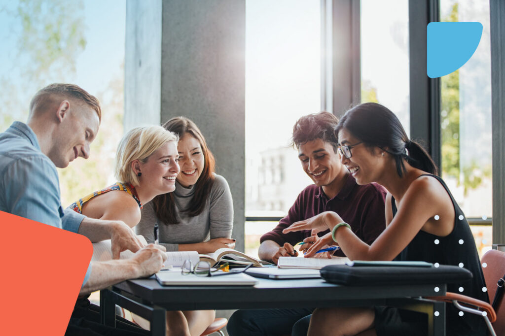 Marketing team together in a library