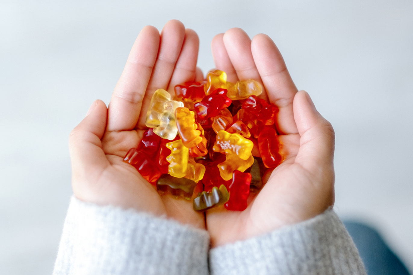 Hand full of healthy gummies