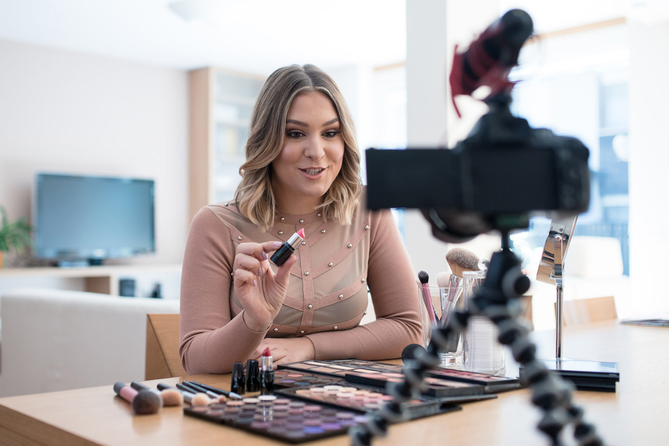 Woman showing a beauty product