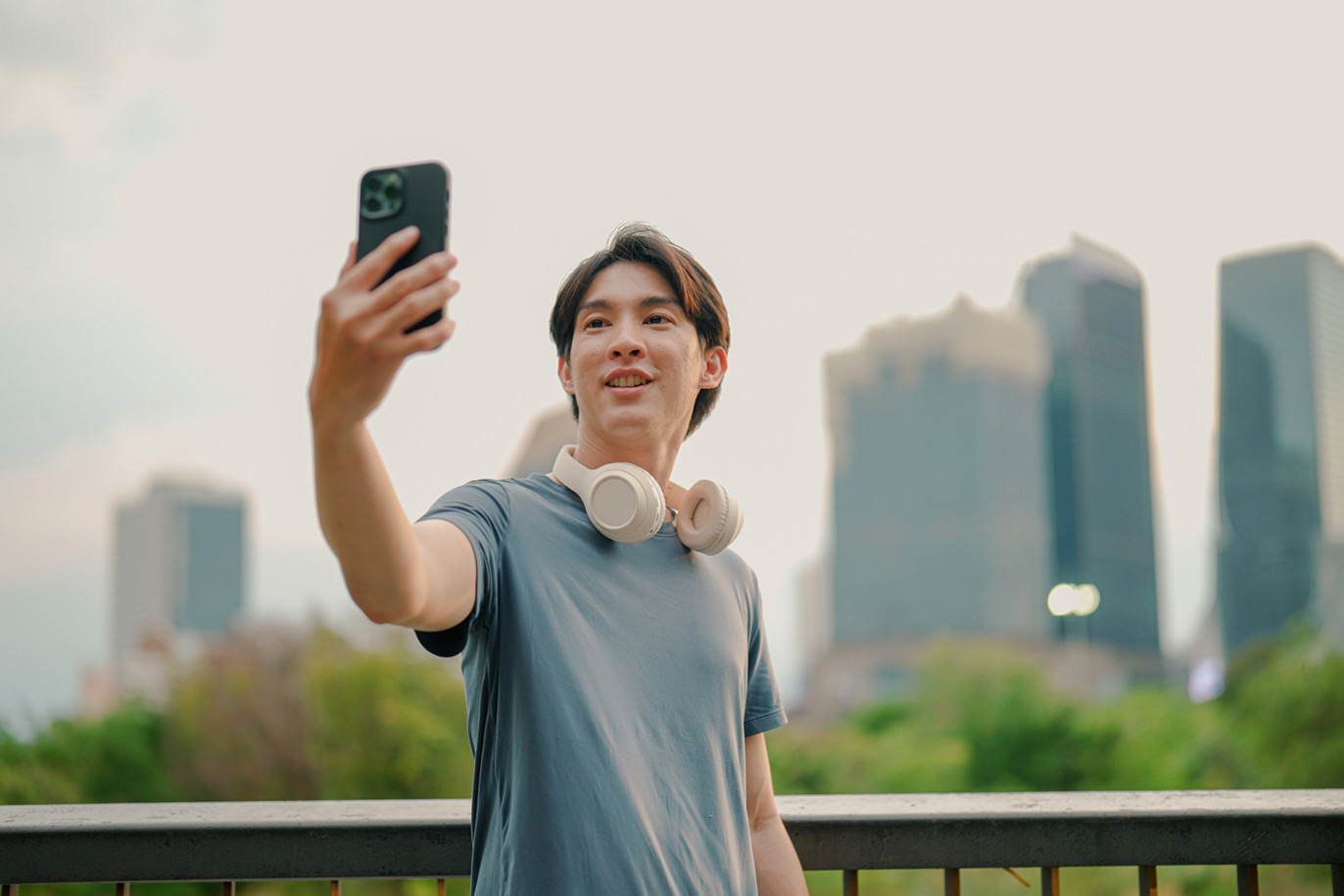 Man taking a selfie in the city