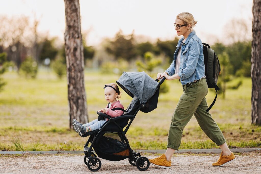 Woman walking with a stroller